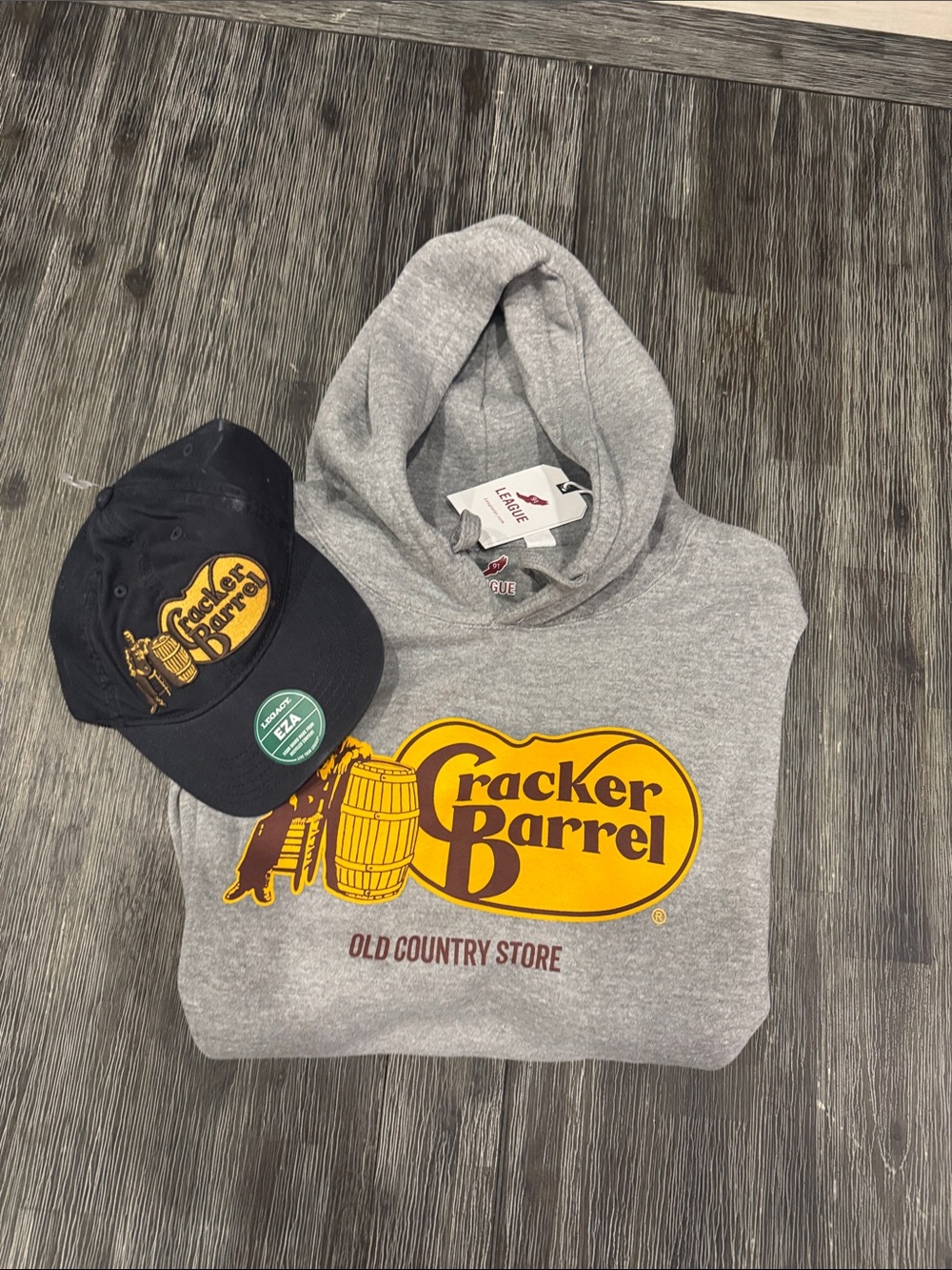 Cracker Barrel Gray Hoodie with Yellow & Brown Logo and Navy Cap